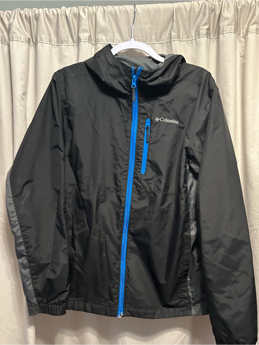 Columbia Black Hooded Windbreaker with Blue Zipper Accents